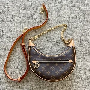 Authentic Louis Vuitton loop bag with dust bag. Like new.